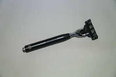 A custom Mach3 blade handle with blade attached